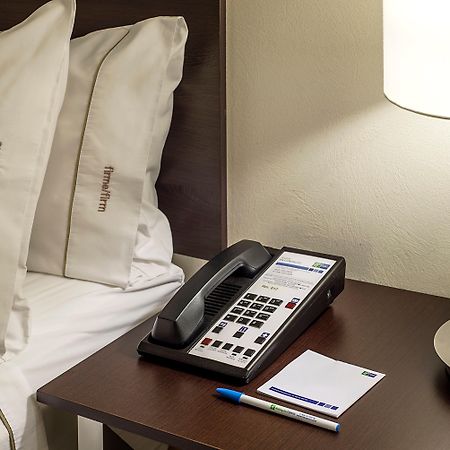 Holiday Inn Express Guaymas By Ihg Esterno foto A telephone in a hotel room
